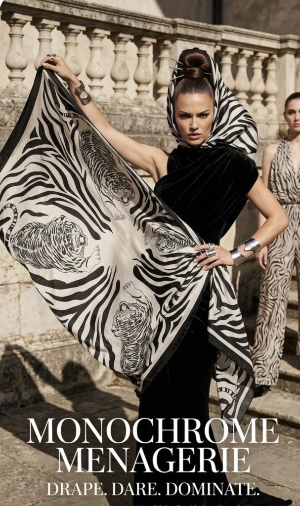 Silk painting process showing colour movement across stretched fabric