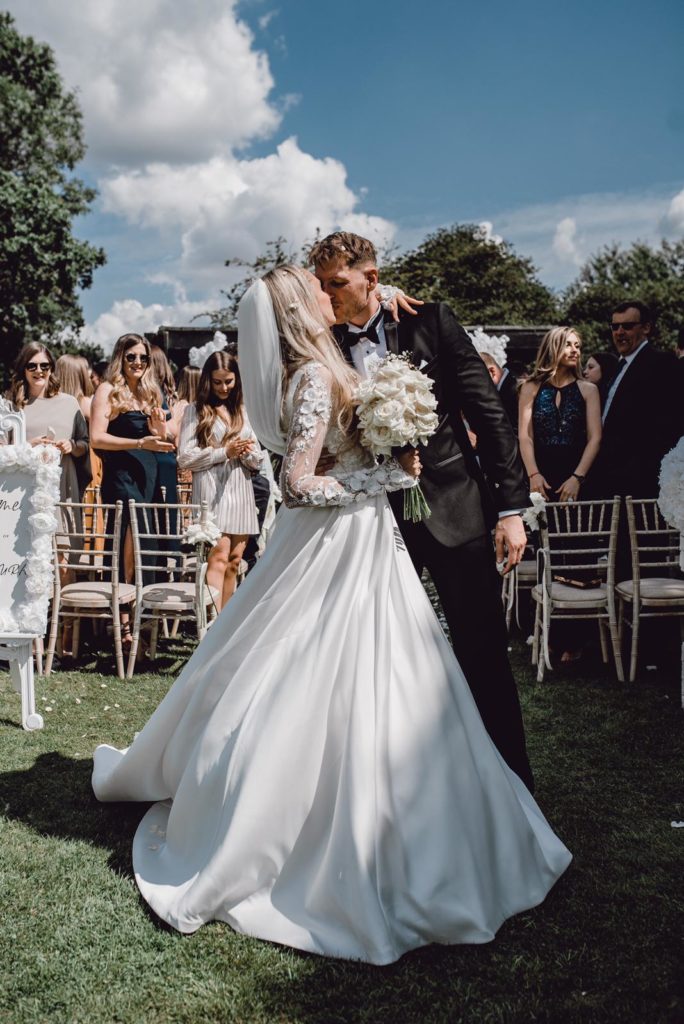 Bride from Crystal Palace wearing altered wedding dress with bespoke bodice redesign