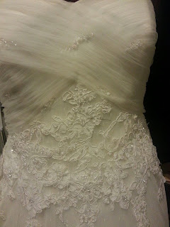 shortened lace wedding dress final result on mannequin