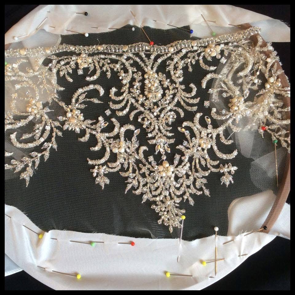 hand beaded wedding dress bodice crystal embroidery detail