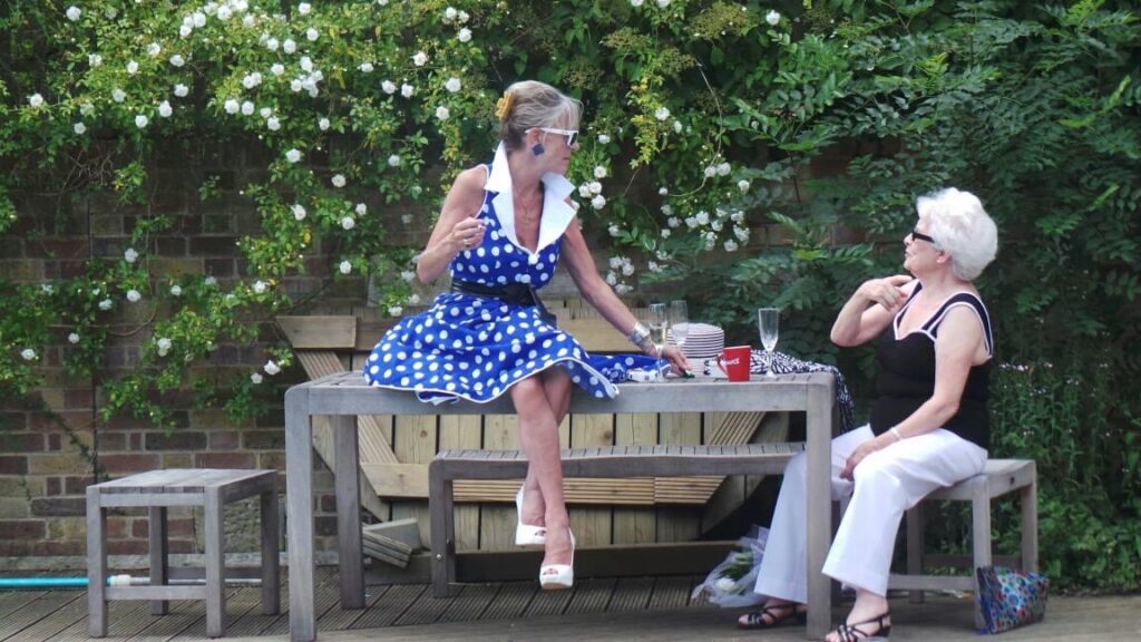 Bespoke polka dot dress Sutton Surrey garden setting