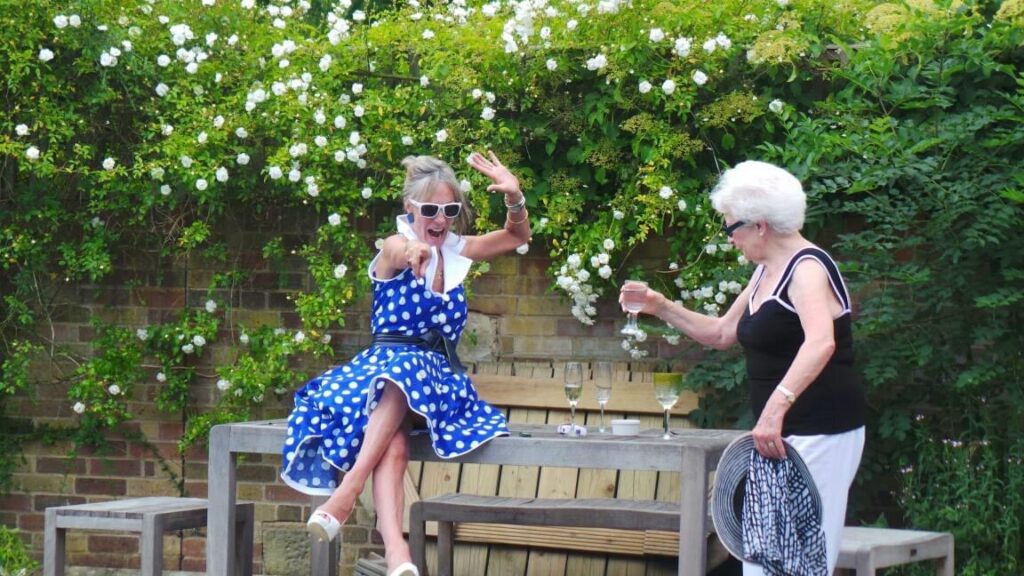 Full skirt polka dot dress structure bespoke couture garden setting 