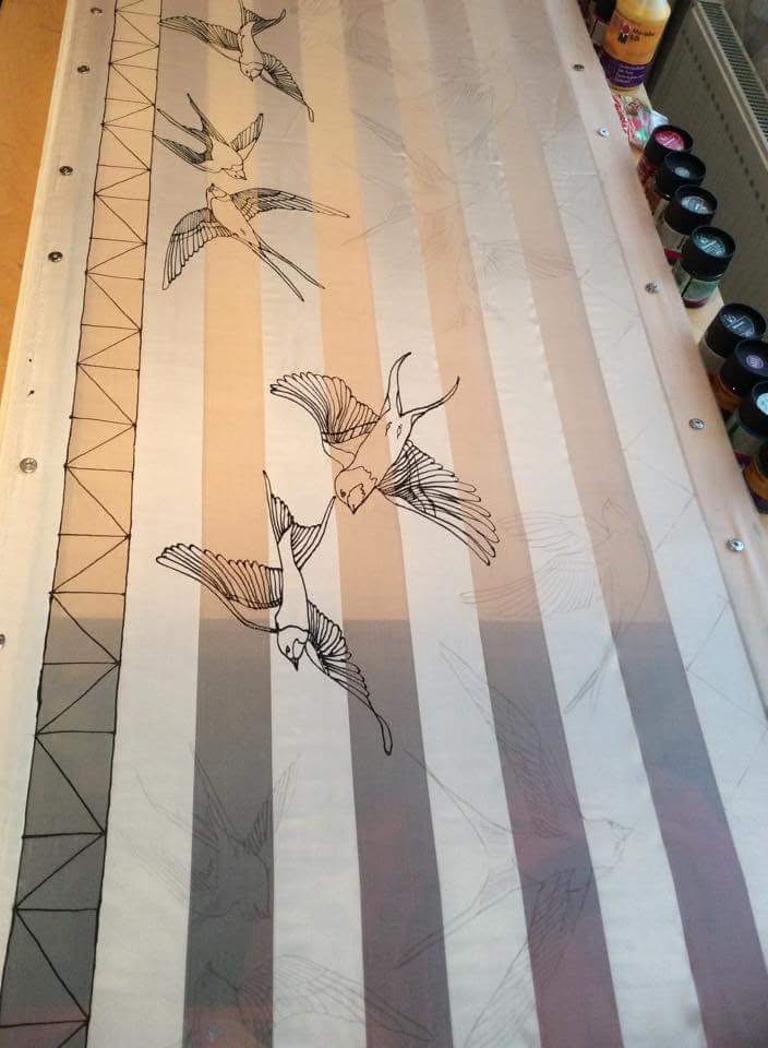 silk scarf painting process on frame swallow design