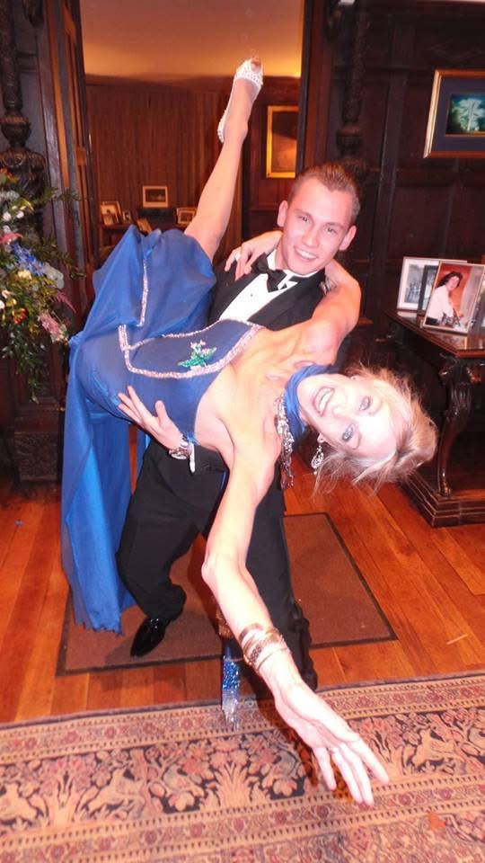 Bespoke blue dress made to measure design with draped silhouette and six slits