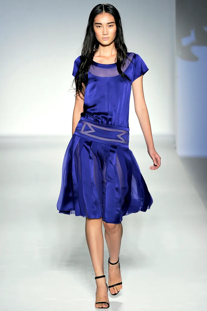 Alberta Ferretti blue dress runway design with draped silhouette and pleated skirt