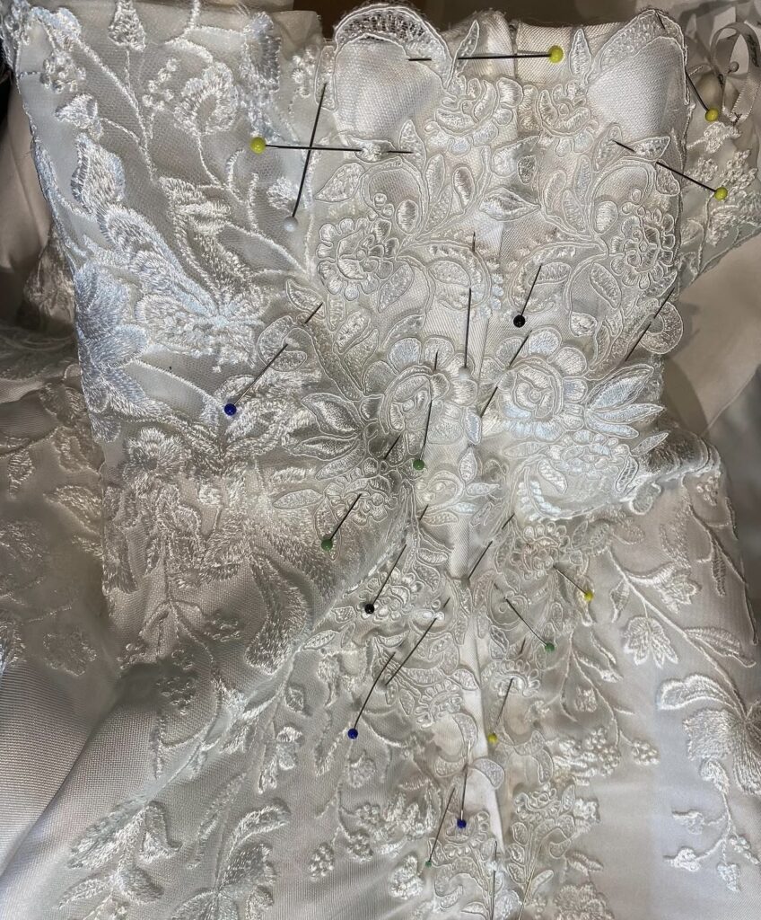 Wedding Dress Resized 4–5 Sizes done with intricate lace applique with zip closure