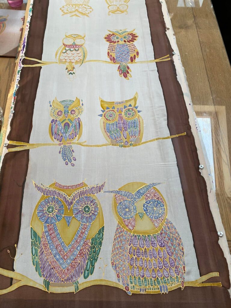 hand painted silk owl detail showing layered dye and gold resist lines
