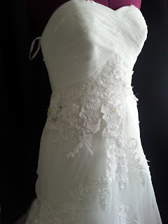 bridal gown reshaping during lace shortening process