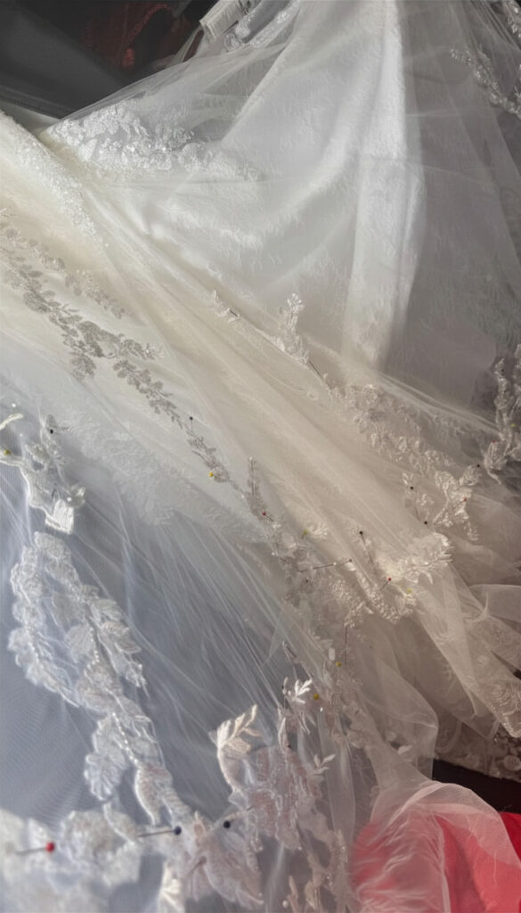 Guildford Bride transformation Unpicked all beaded hem to lift it to new hem 