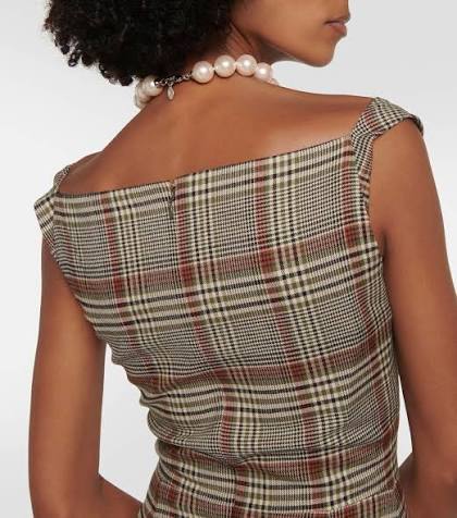 Back shoulder and neckline view of Vivienne Westwood Mother of the Bride dress before alterations