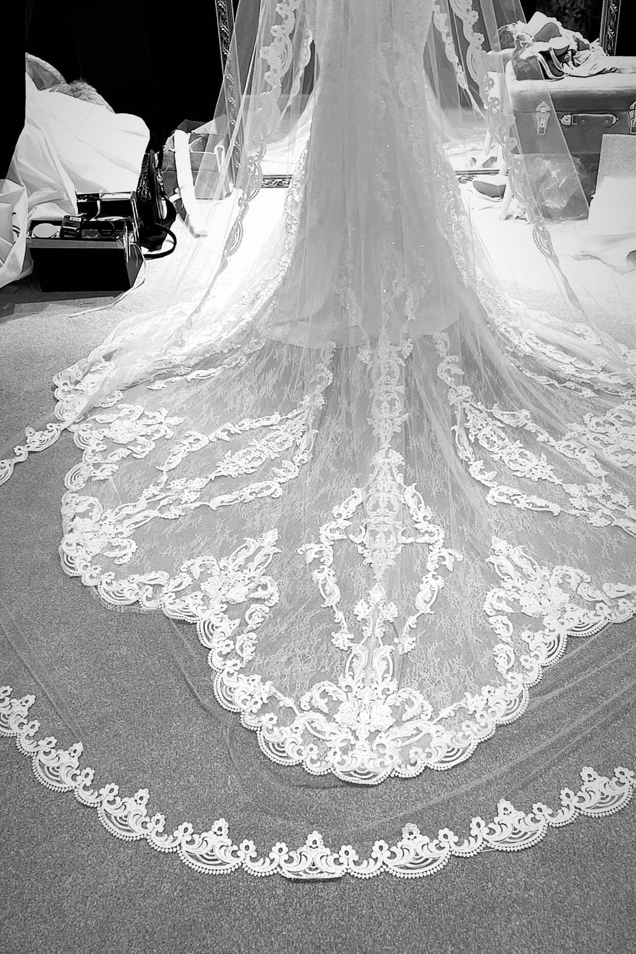 Bespoke cathedral bridal veil with hand-applied lace appliqué created from scratch