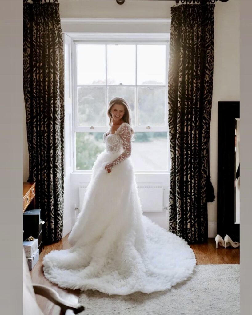Bridal seamstress fitting Martina Liana Luxe & Enzoani wedding dress in Sutton Surrey studio