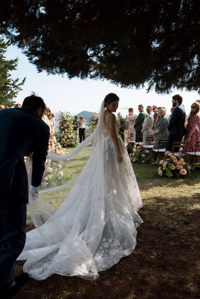Couture Martina Liana wedding dress restructuring with flowing cathedral train