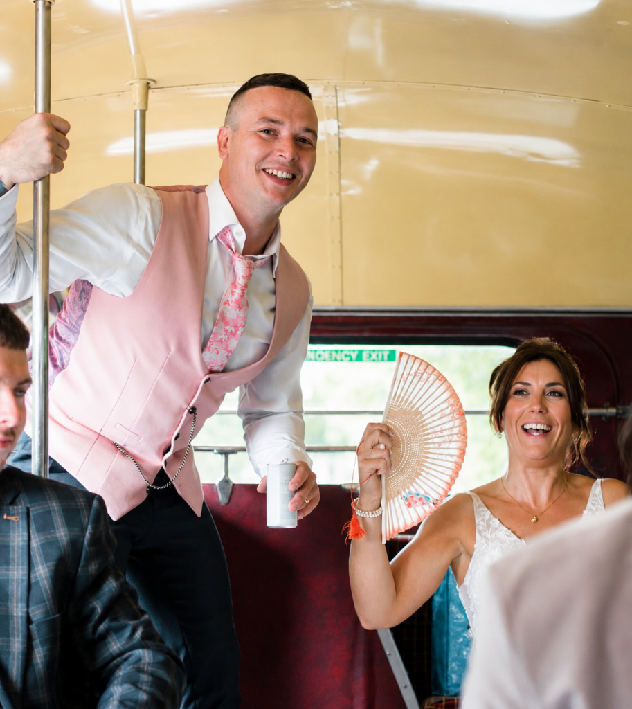 Groom and bride celebrating their wedding day after professional wedding suit alterations in Greater London