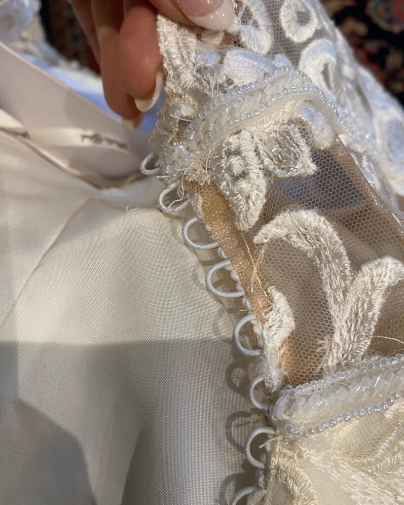 replaced button loops added all along centre back