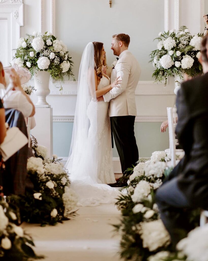 Enzoani fitted wedding dress bridal alterations with cathedral veil