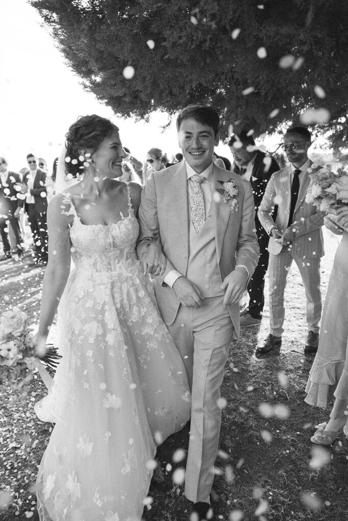 bride and groom both perfectly fitted outfits