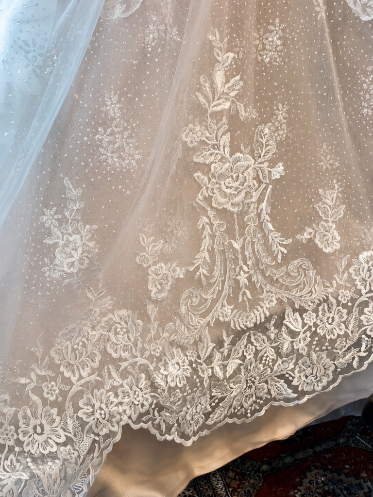 hem was completely unpicked meticulously then reattached to the desired height