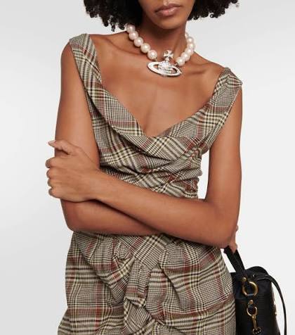 Vivienne Westwood draped tartan dress front detail showing sculptural folds and neckline