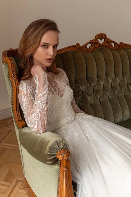 wedding dress before alterations with embroidered appliqué detail