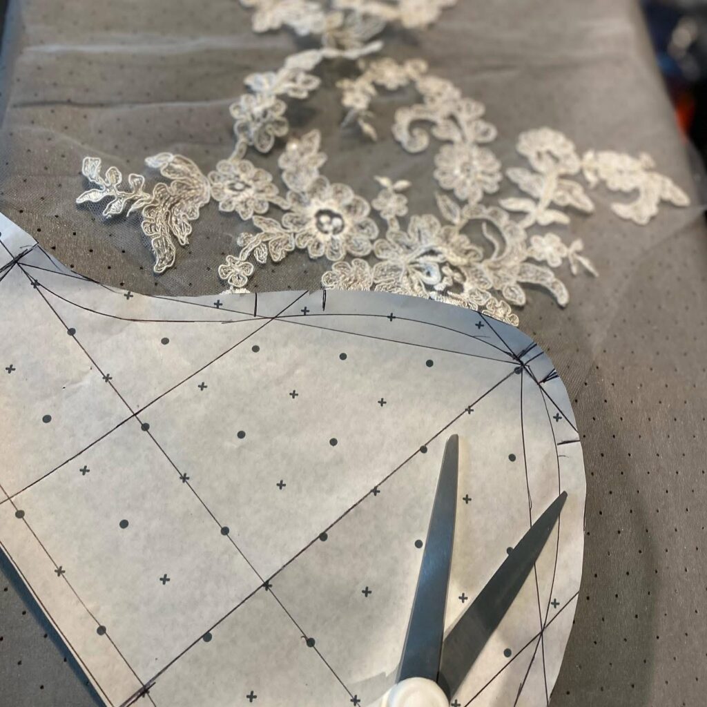 Full illusion neckline and half sleeved added to this dress