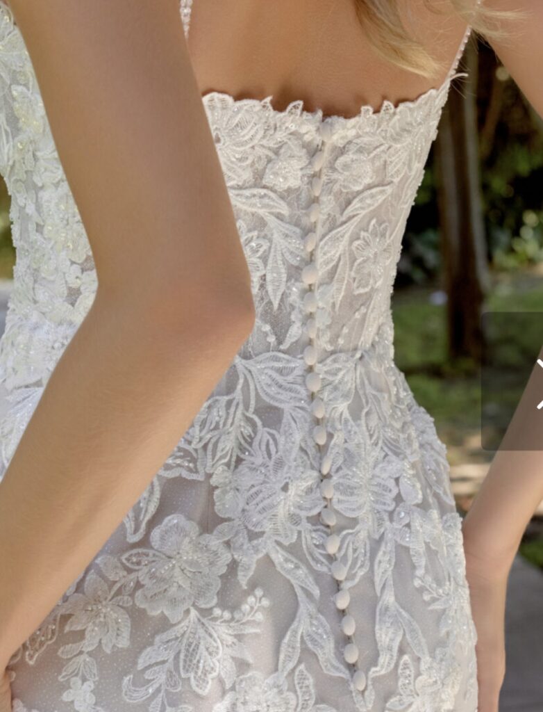 Essense of Australia wedding dress couture alterations with low back redesign and lace train before alterations