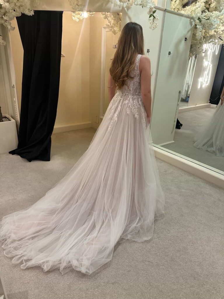 Bride back view before Stella York wedding dress was altered
