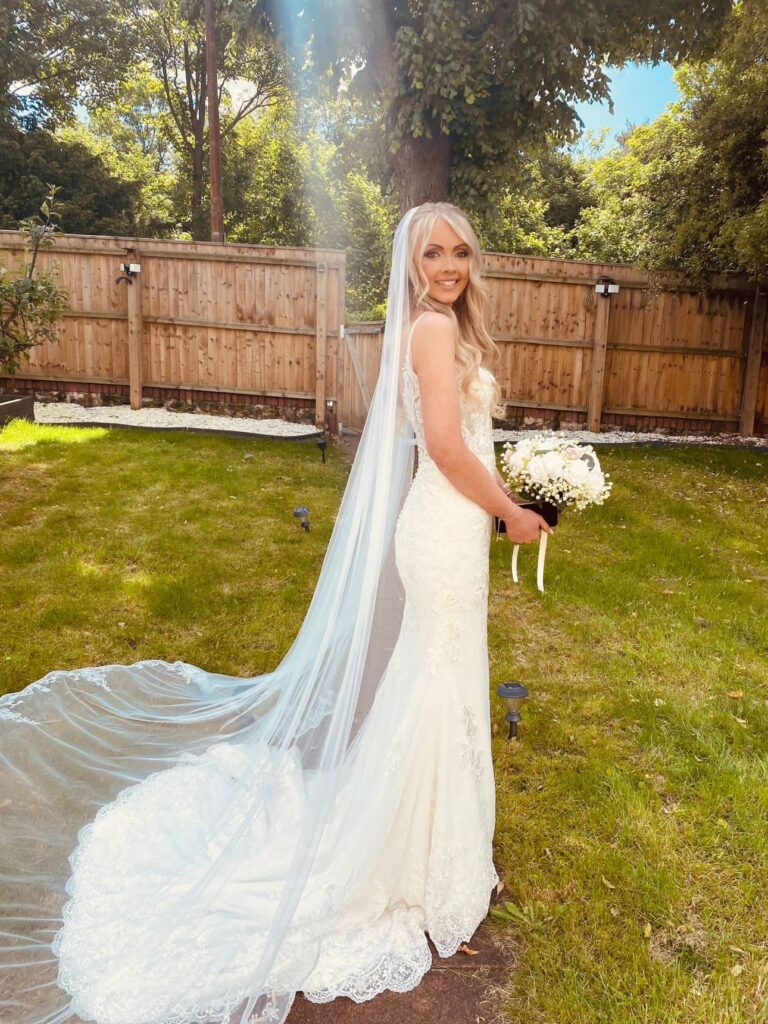 A bride who bought her dress from WED2B lost weight and this was resized 4-5 sizes down