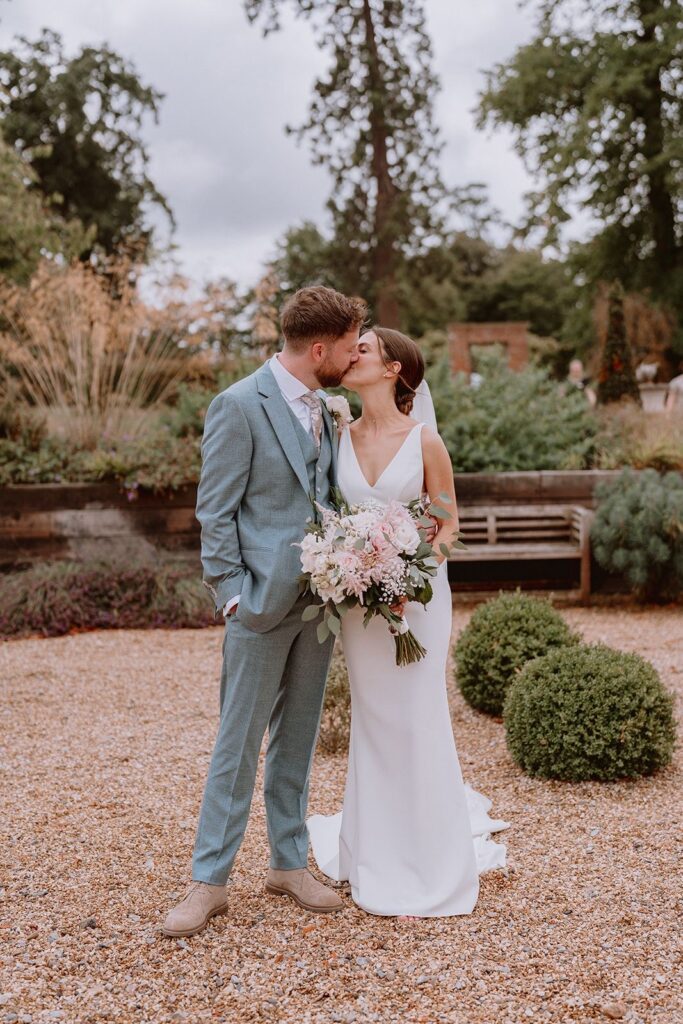 bride and groom all well fitted outfits 