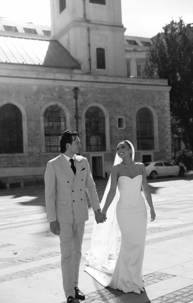 bridal alterations epsom bride groom walking outdoor
