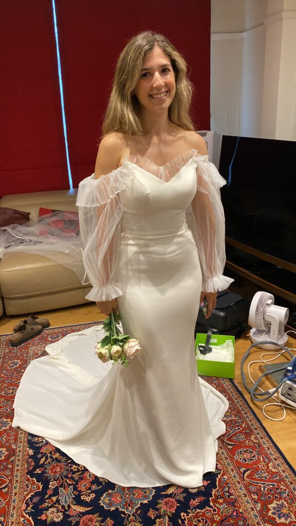 Wedding dress all finished at final fitting with couture bridal sleeve reconstruction using pleated illusion tulle