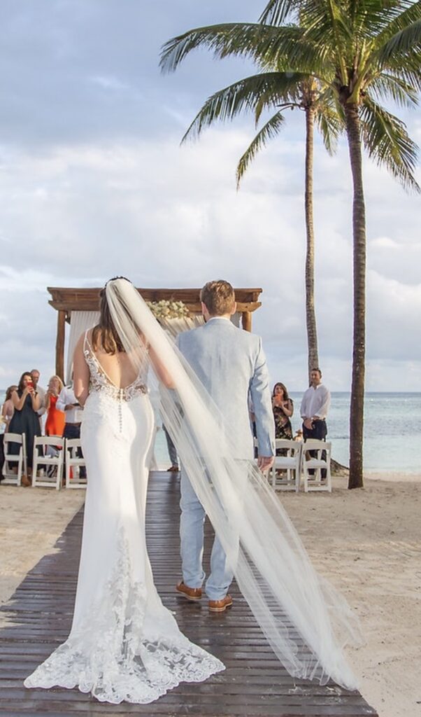 Minimalist wedding dress with couture bridal alterations and balanced full skirt jamaica destination