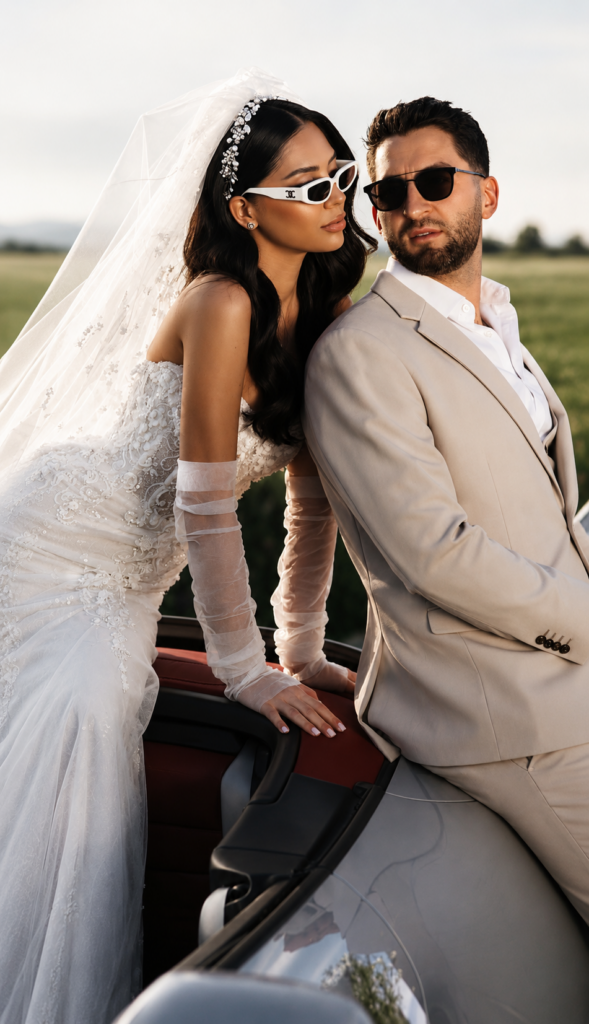 Couture wedding dress alterations with reconstructed embroidered corset bodice couple in porche