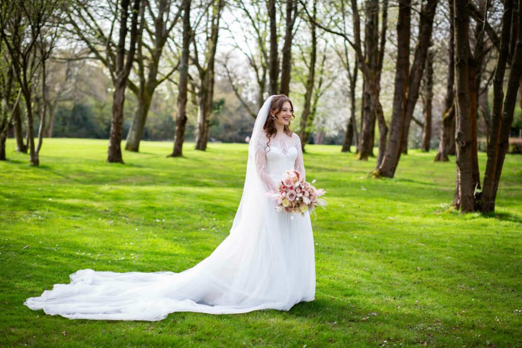 Eva Lendel Sabrina bridal alterations Surrey featuring illusion sleeves and heavily beaded bodice restructuring