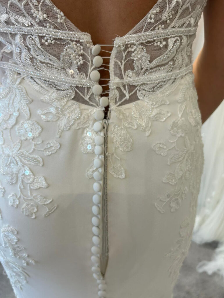 Essense Of Australia sample sale wedding dress before bridal alterations loop repair needs 