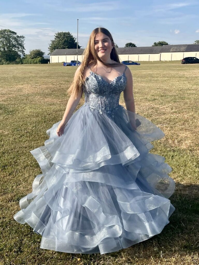 Layered steel blue prom gown with couture skirt reshaping and formalwear alterations