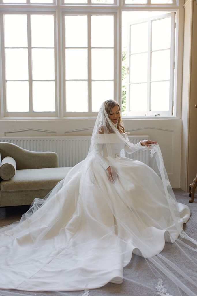 Luxury Ronald Joyce bridal alterations London couture satin wedding dress transformation