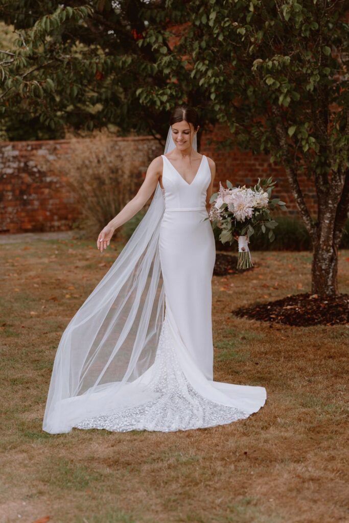 Bride wearing altered Made With Love Jessie gown in Greater London