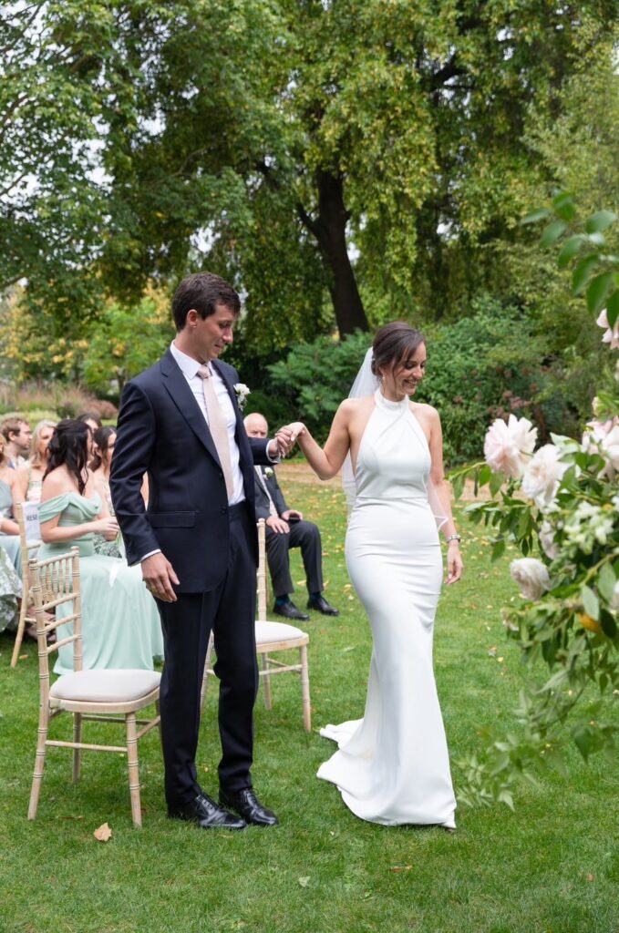 Crepe Made With Love wedding dress fitted through waist and silhouette