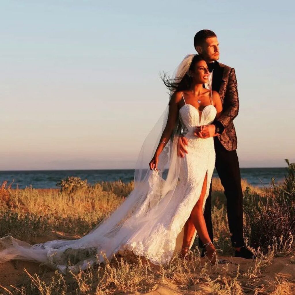 Martina Liana wedding dress with couture split alteration and bespoke veil