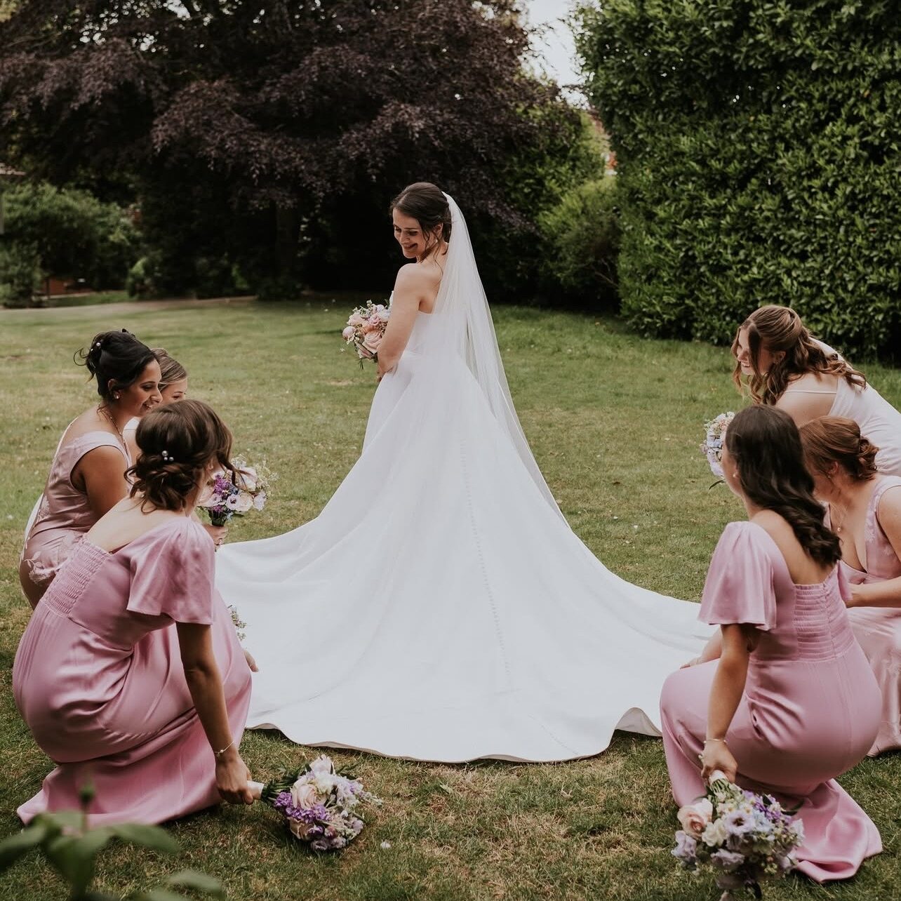 Mila Nova bridal alterations featuring hidden corsetry and sculpted bodice fit and hidden bustle