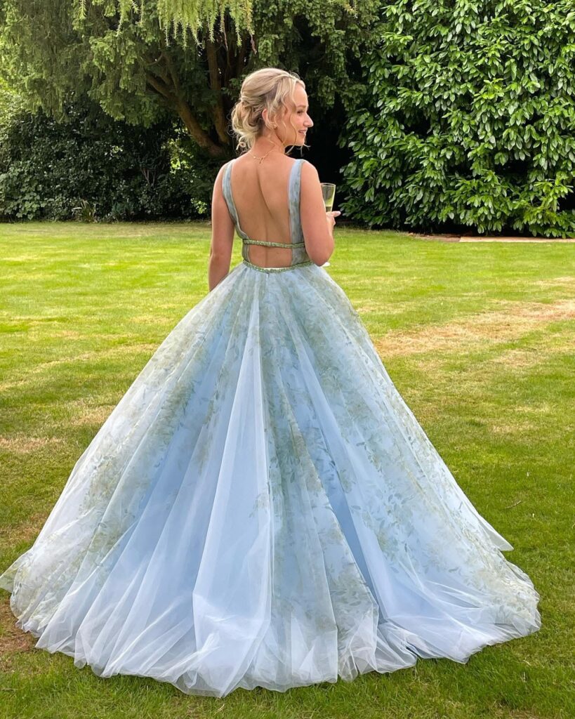 Couture prom dress alterations with layered floral blue ball gown in Sutton Surrey back view