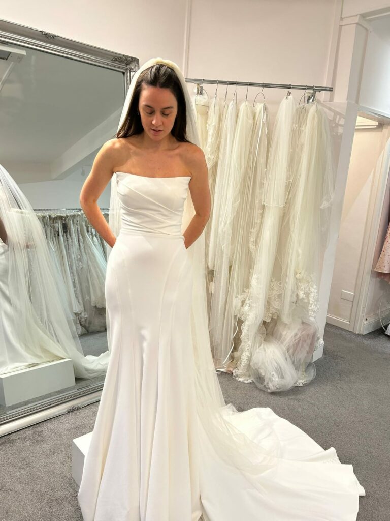 Oversized sample sale wedding dress before couture bridal restructuring