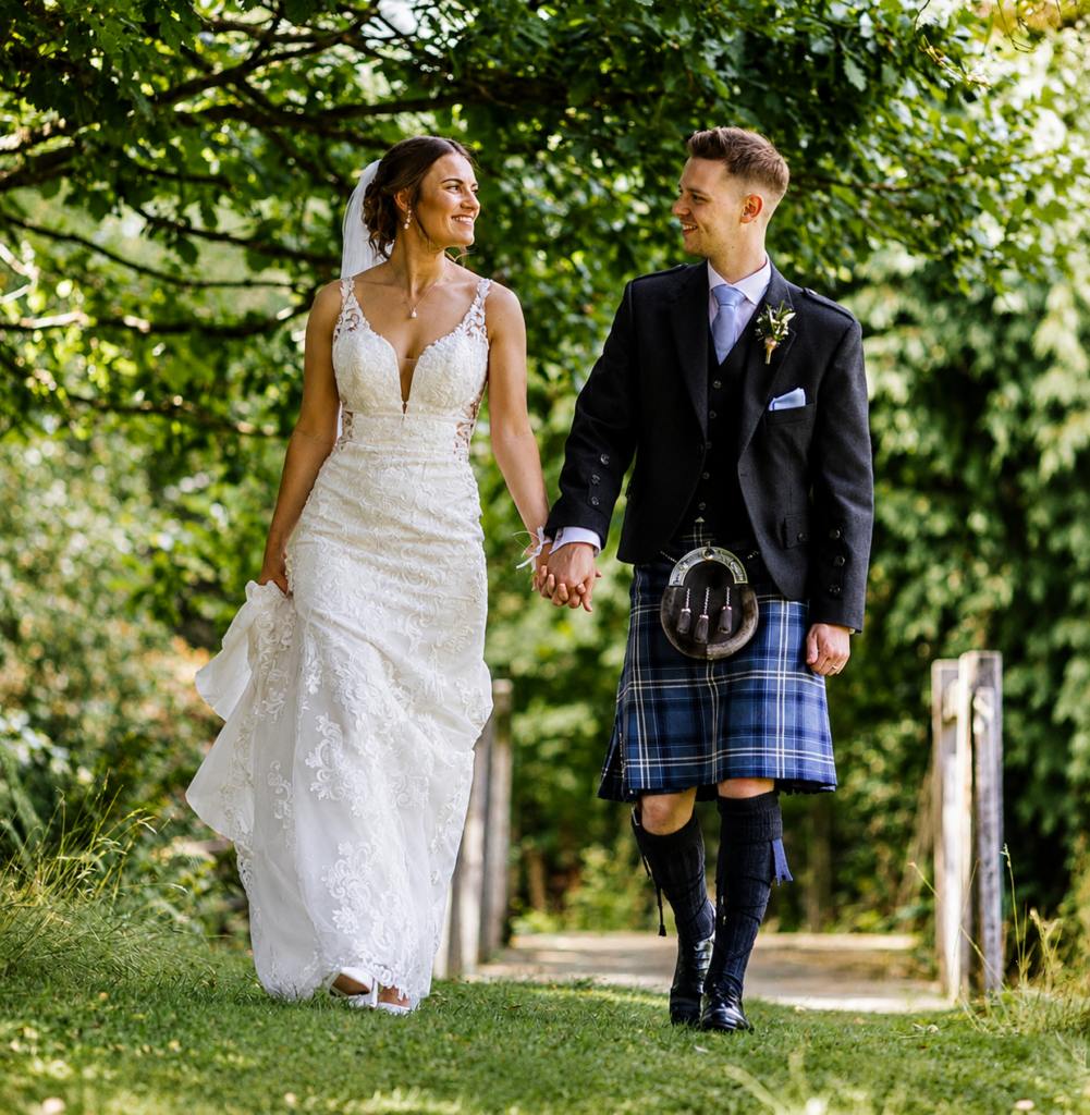 Stella York bridal gown with illusion lace alterations and couture reshaping during outdoor wedding ceremony
