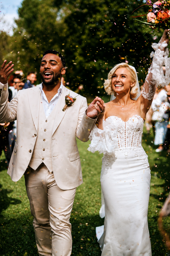 Bride and groom celebrating on the wedding day