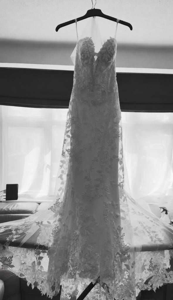 Steam pressed bridal dress and veil prepared for collection in Sutton Surrey