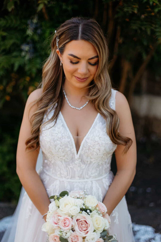 Bride leaving UK wedding ceremony in altered Stella York bridal gown