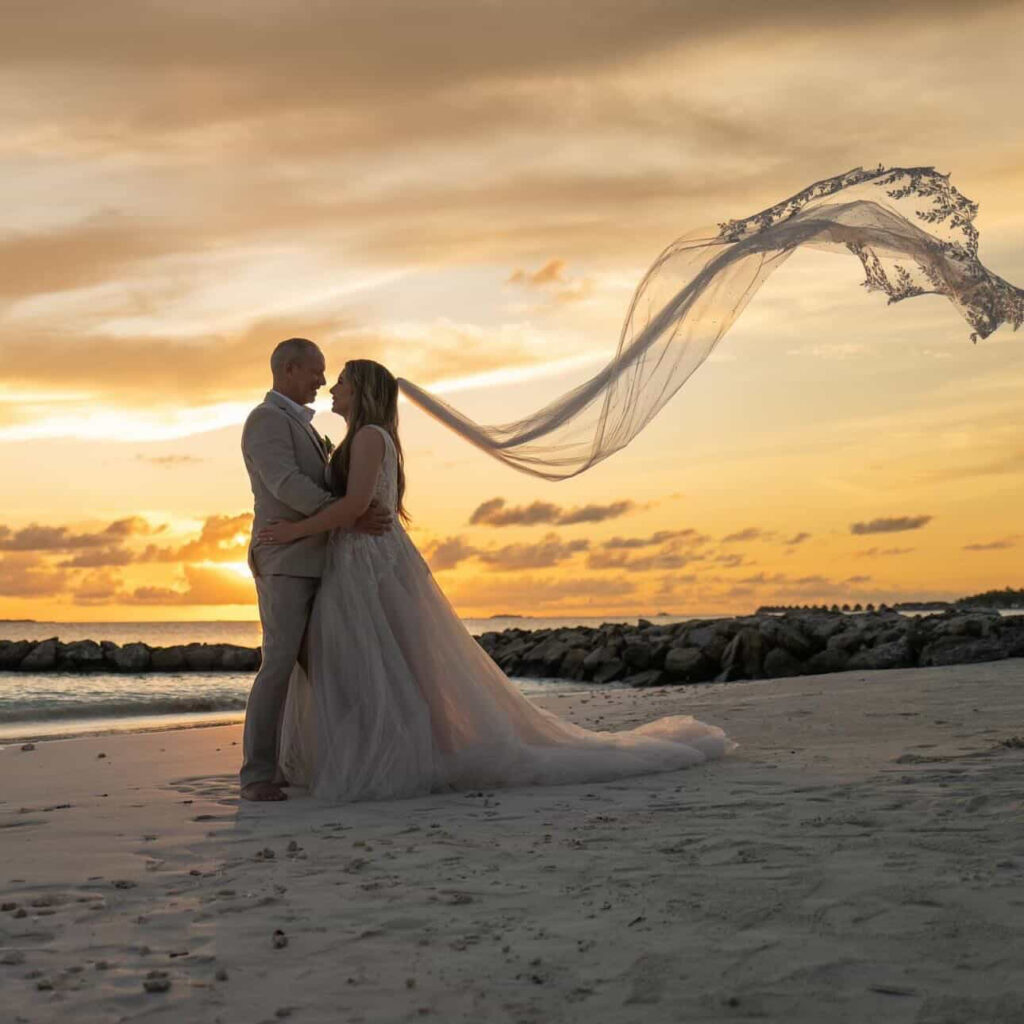 Editorial Maldives destination wedding portrait in altered Stella York bridal gown bride is from Wallington