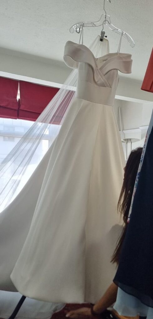 Stella York satin wedding gown prepared for bridal alterations