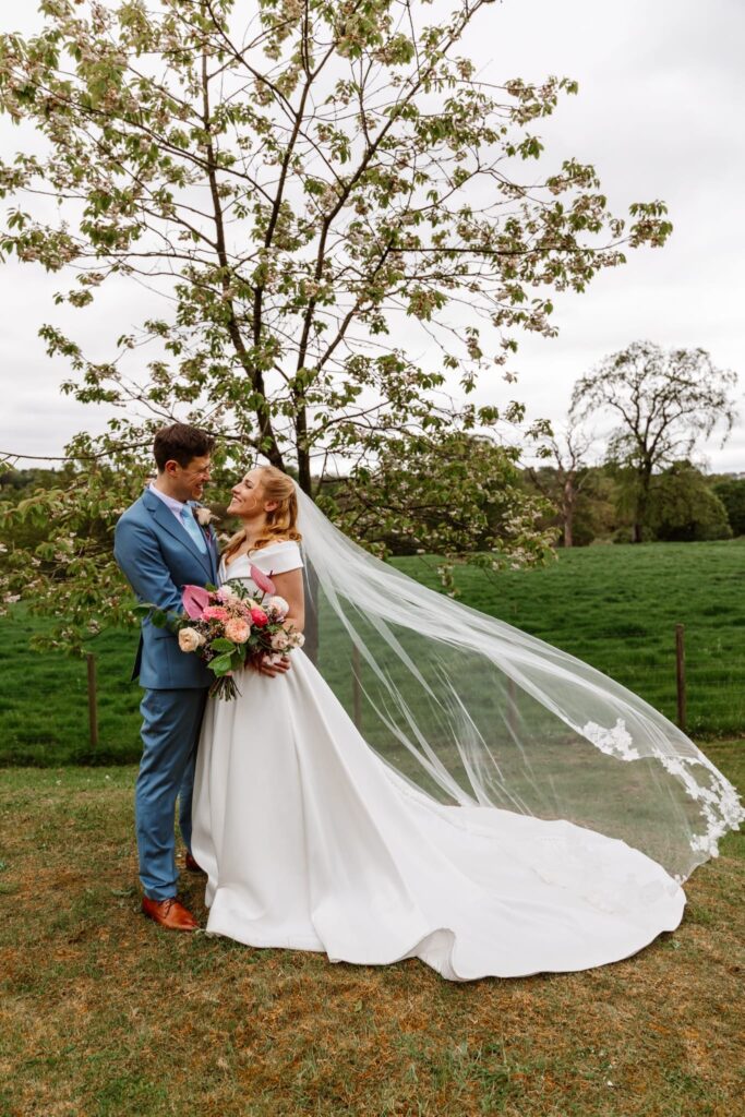 Stella York wedding dress alterations with cathedral veil completed in Sutton Surrey